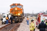 BNSF 3973 - Engineer Mims looking over the damage